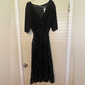 Alex Evenings midi length black dress with black rosettes